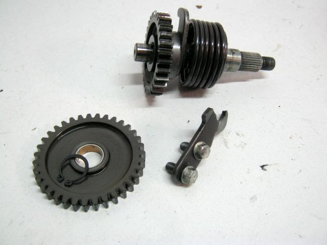 Arbre, pignon, ressort de kick KAWASAKI 125 KMX année 1999 type MX125B réf 590511164, 130661066