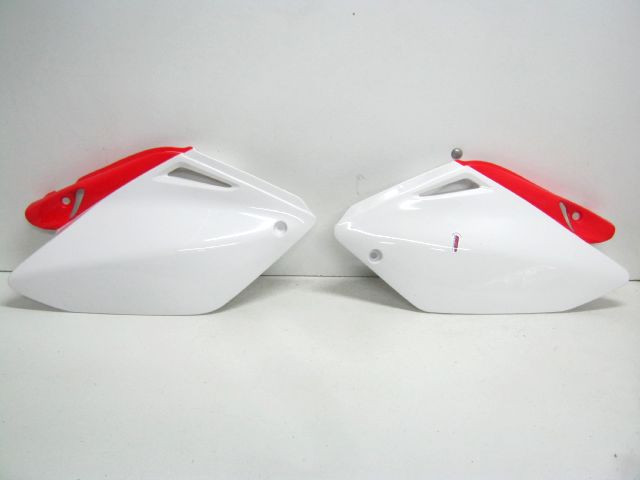 Carter latéraux droit et gauche HONDA CRF 250 an 2004 réf 86018-00001 